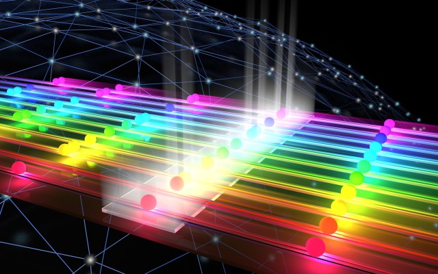 The graphic visualises quantum mechanical interference, also called the Hong-Ou-Mandel effect: A yellow and an orange photon hit a frequency mixer (white bar) from the right and emerge always together in the same color, here two yellow photons. The graphic visualises quantum mechanical interference, also called the Hong-Ou-Mandel effect.